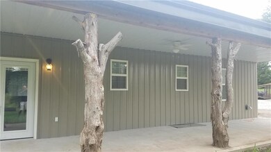 Enjoy evenings on the back covered porch.