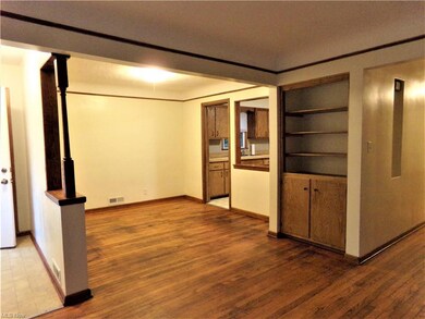 Formal Dining with Built-in Cabinets and Shelves