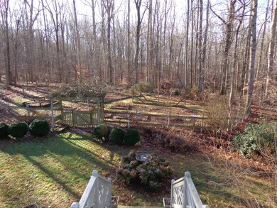 View of rear yard/garden area from deck