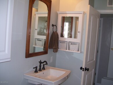 Hall bath vanity area