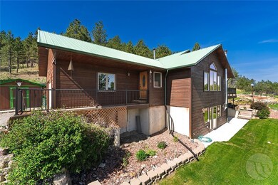 View from NE to the south west. Wood siding, fanta