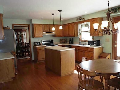 Kitchen. Roomy 7x6 laundry room with laundry tub conveniently located on the first floor. Has both gas or electric connection for the dryer.