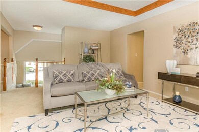 View of Great Room Looking Into Entry & Entry Wind