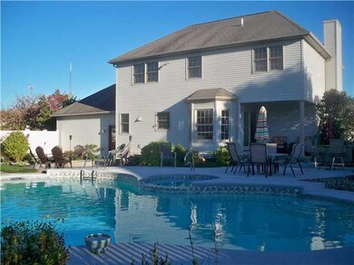 Exterior Back. Gorgeous gunnite pool has a 10 pers