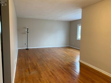 Large open floor plan with large living room, natural light brightens the space.