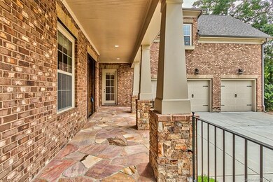 Covered front porch with additional side entry doo