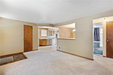 The family room is open to the kitchen & dining ro
