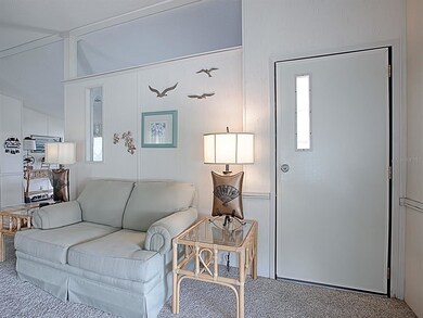 LOVELY LIVING AREA WITH DECORATIVE WALL CUT-OUT AC