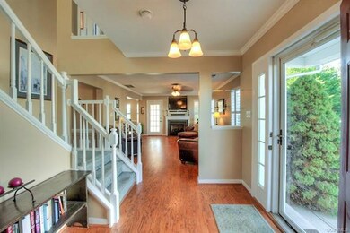 Hardwood floors in the foyer, family room, & dinin