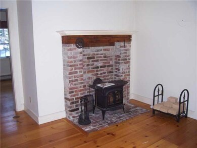 Living Room. woodstove in livingroom