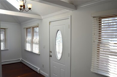 Spacious entry with vaulted ceiling...