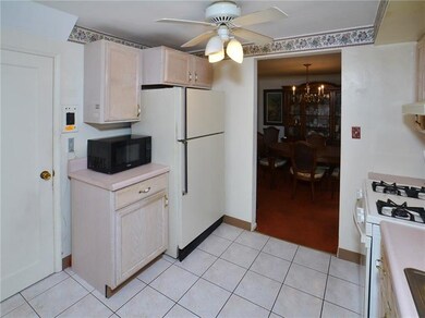 Kitchen w/Ceiling Fan Light Fixture.  Looking into