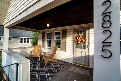 Covered porch to sit and relax on
