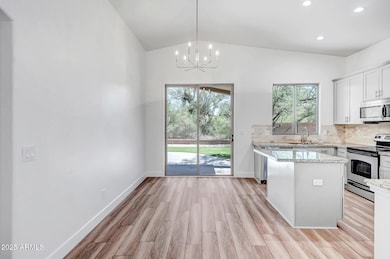 Kitchen with eating area and breakfast b