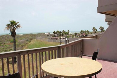Balcony view of pool and ocean