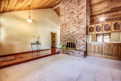 Dual fireplace and wet bar