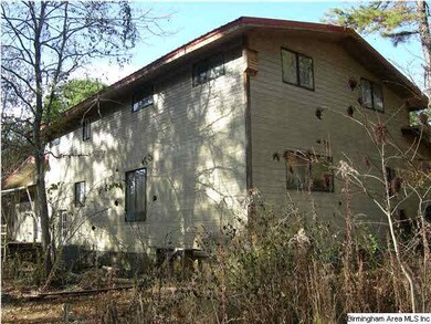 LEFT REAR OF HOME