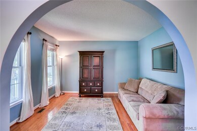 Formal living area with beautiful hardwood floors,