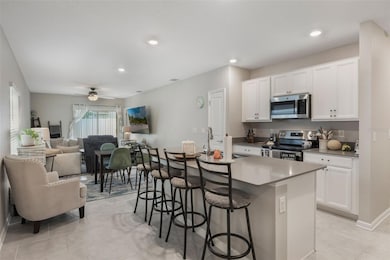 Kitchen Area Overlooking Dining and Great Room