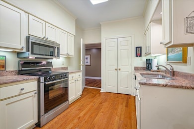 Kitchen featuring appliances with stainless steel 