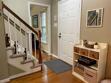 WOOD FLOORS at entry, Family Room & Dining Room (n