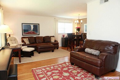 Family room has nice hardwood flooring