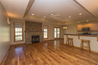 Living room, beautiful stone, gas fireplace!  Don'