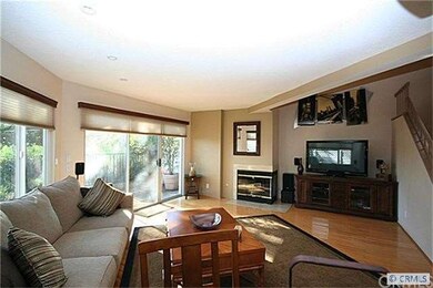 Sunny living room with hardwood floors