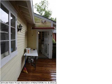 The wood deck in back yard