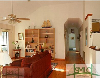 Living Room. Pretty hardwoods, vaulted ceilings