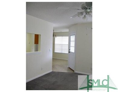 Living Room. HERE IS A VIEW FROM THE HALLWAY TOWAR