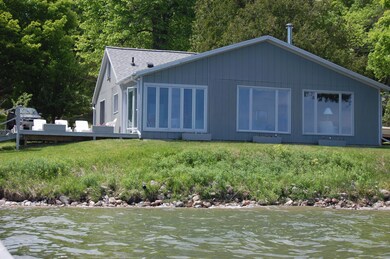 Close to the water with extra side lot