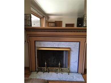 Picturesque Fireplace with sizeable mirror that ma