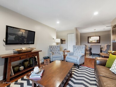 Luxury hand-scraped laminate floors throughout. Op