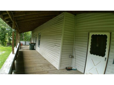 View 52' x 8' of covered front porch with 2 entran