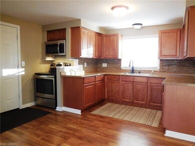 4870 Elmwood Dr, Sheffield Lake, OH 44054 - photo 5