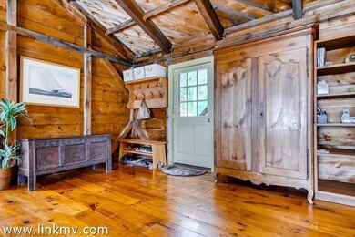 Hardwood flooring and high ceilings in this charming Chilmark cabin