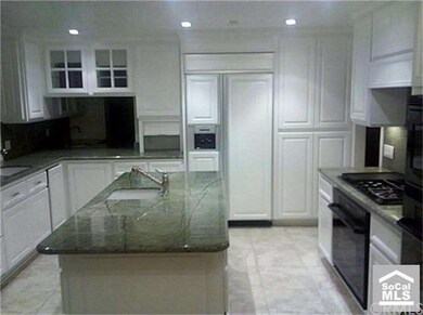 Kitchen (Refrig & Cabinets)