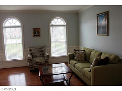 Living Room - Living Room offers hardwood floors, 