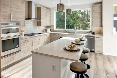 Photo of a previously built unit. Same floor plan, similar finishes with potential color differences.