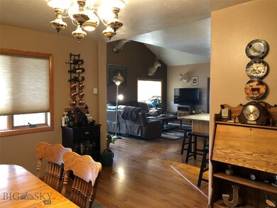 Dining room opens to living room and kitchen for o