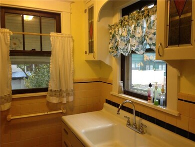 Kitchen, surrounded in stain glass windows