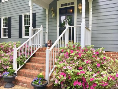 AGGREGATE SIDEWALK INTRODUCES COVERED FRONT PORCH 