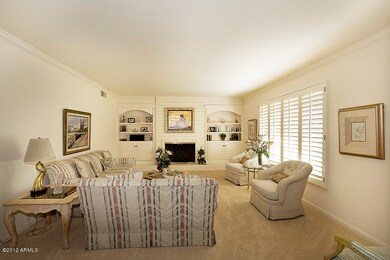 Living Rm w/ Fireplace + Picture Window