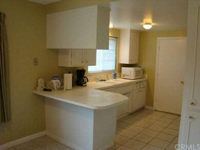 Kitchen and door to the garage. 