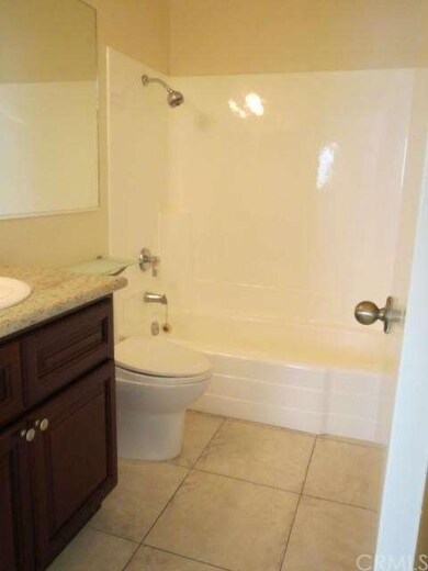 Bathroom with granite countertop
