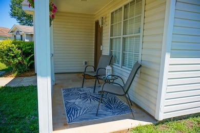 View of patio with covered porch
