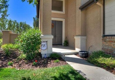 Large entrance area accented by columns.