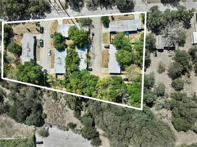 Aerial view of property's location featuring property parcel outlined