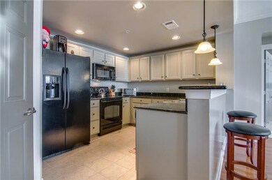 Kitchen with granite bar area